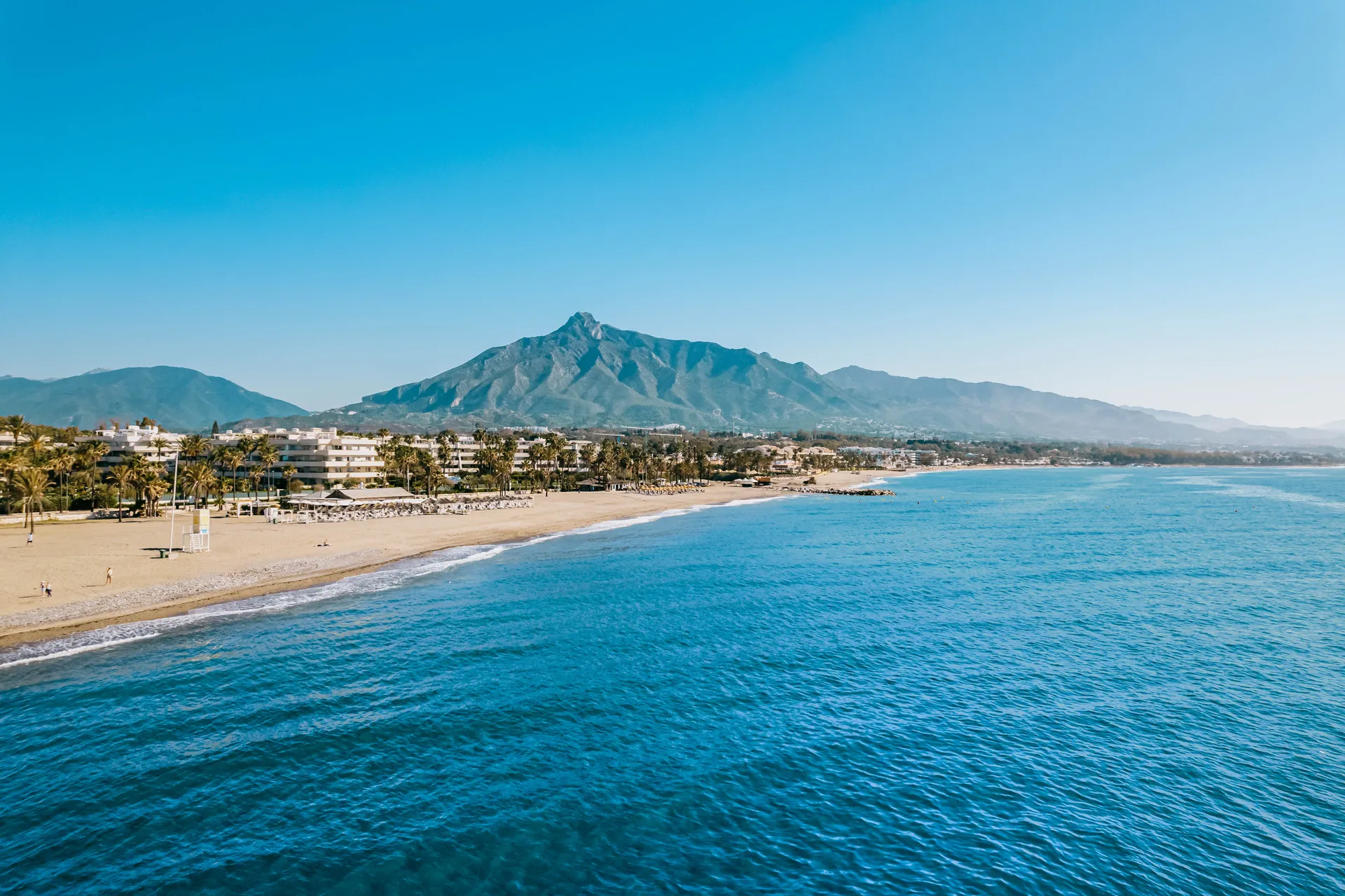 Marbella town beach and the sea with the La Concha mountain behind